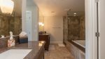 Master ensuite with spa tub, separate glassed shower and water closet
